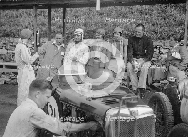 MG C type of Cyril Paul in the pits at the RAC TT Race, Ards Circuit, Belfast, 1932. Artist: Bill Brunell.