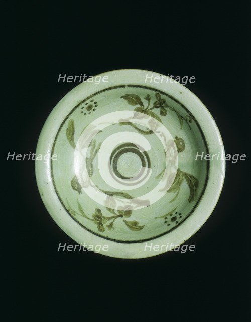 Celadon saucer with underglaze brown birds on branches, China, c1900. Artist: Unknown