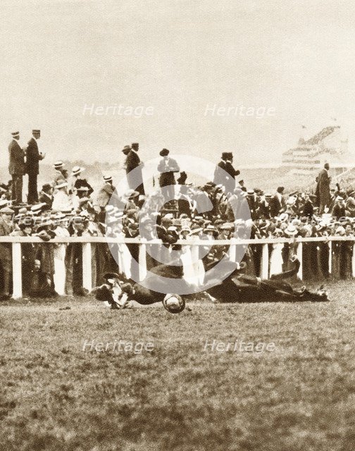 Emily Davison throwing herself in front of the King's horse during the Derby, Epsom, Surrey, 1913. Artist: Unknown