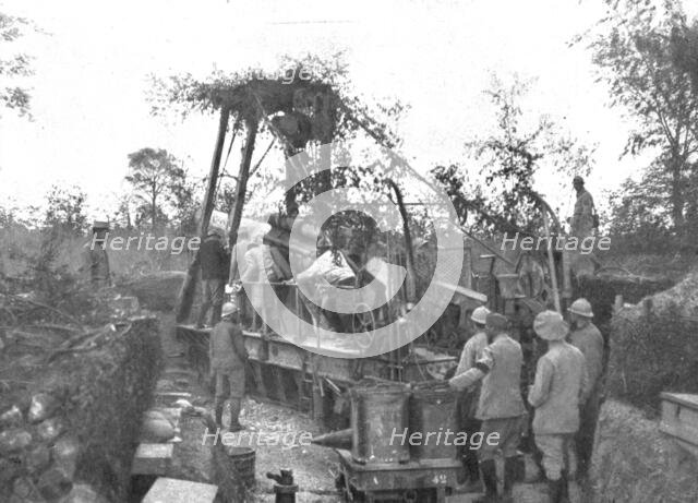 ''La preparation d'artillerie; une piece du 240 en action', 1916 (1924). Creator: Unknown.
