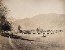 A bridge over the river Jehlum with a town, Baramula, Kashmir, India, c1860s. Creator: Samuel Bourne.