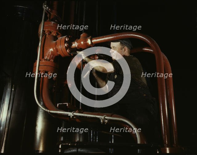 Maintenance man at the Combustion Engineering Co. working at the largest...Chattanooga, Tenn., 1942. Creator: Alfred T Palmer.