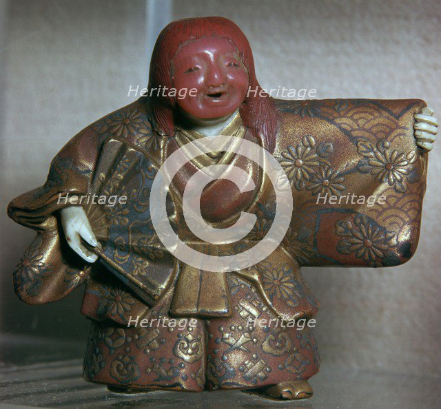 Japanese Netsuke of a No dancer as a Shojo. Artist: Masahira