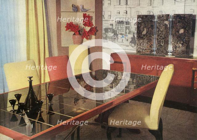 'Dining-room in sang-de-boeuf lacquer, by Hayes Marshall for Fortnum & Mason Ltd., London', 1937. Creator: Unknown.