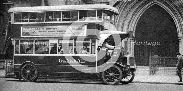 A double-decker bus standing outside the Law Courts, London, 1926-1927. Artist: Unknown