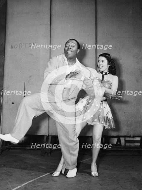 Portrait of Louis Jordan, Paramount Theater(?), New York, N.Y., ca. July 1946. Creator: William Paul Gottlieb.