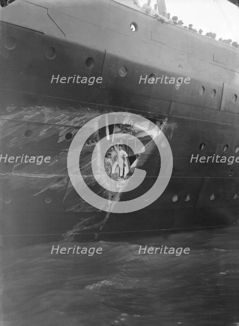 Hole torn in the hull of 'RMS Olympic' after the collision with 'HMS Hawke' in the Solent, 1911. Creator: Kirk & Sons of Cowes.