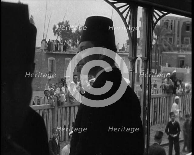 Farouk I, His Majesty The King of Egypt Waving to Crowds, 1936. Creator: British Pathe Ltd.