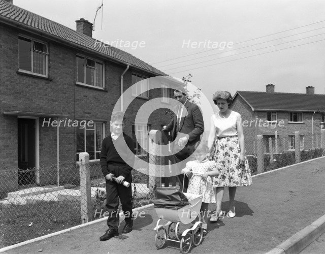Street scene with family, Ollerton, North Nottinghamshire, 11th July 1962. Artist: Michael Walters