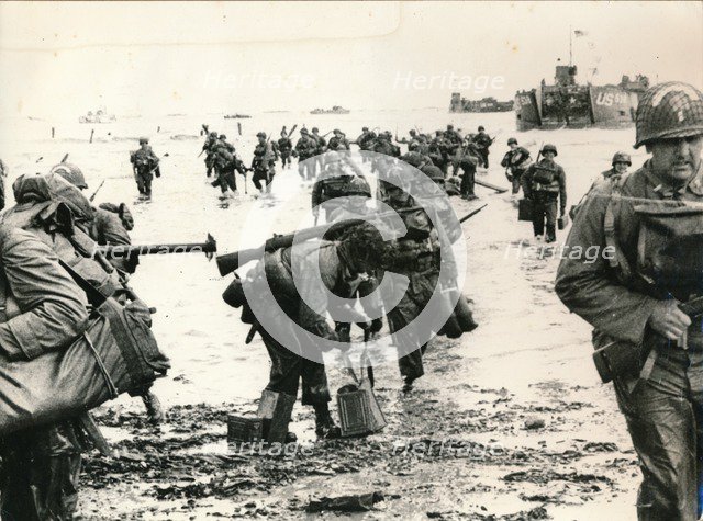 US assault troops landing on a beachhead, Normandy, 1944. Artist: Unknown