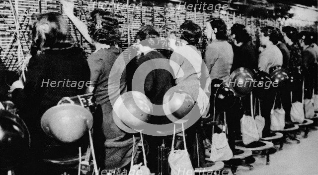 'To Sit There And Carry On as though nothing was happening outside was not easy', 1941 (1942). Artist: Unknown.