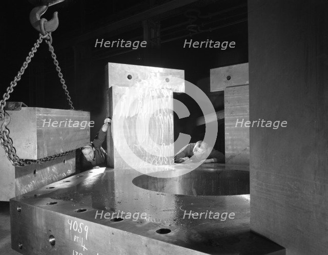 Inspecting a bubble chamber casting, Edgar Allen's steel foundry, Sheffield, South Yorkshire, 1964. Artist: Michael Walters