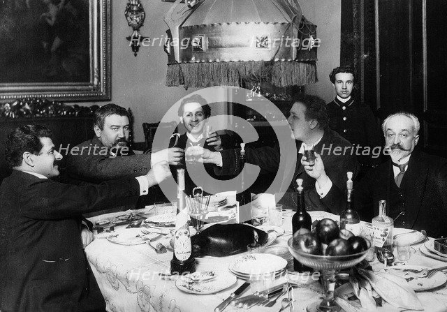 Russian author Alexander Kuprin with friends in Paris, 1930s.  Artist: Anon