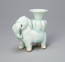 Joss-Stick Holder in the Form of an Elephant Holding a Lobed Vase, Yuan dynasty (1271-1368). Creator: Unknown.