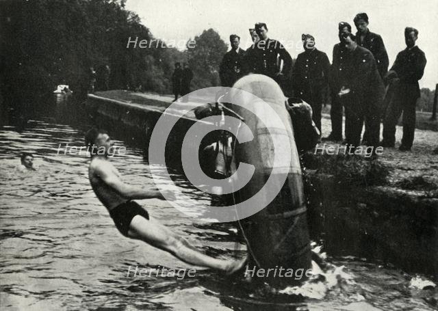 RAF personnel learning to use a dinghy, 1941.  Creator: Charles Brown.