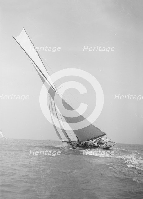 The 45 ton cutter 'Camellia' sailing close-hauled, 1911. Creator: Kirk & Sons of Cowes.