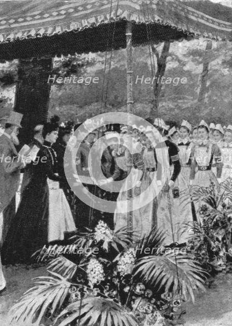 'Princess Alexandra Presenting Certificates to Nurses at Marlborough House, July 21, 1899', (1901).  Creator: Unknown.