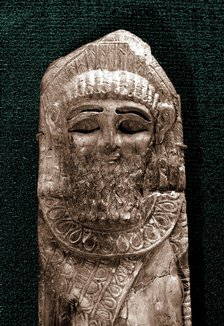 Fragment of a Pheonician style ivory of a bearded head, Assyria, Iraq, probably 8th century BC. Artist: Werner Forman