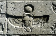Limestone relief of a scarab beetle and vulture wings under a disk of the sun, Edfu, Egypt. Artist: Unknown