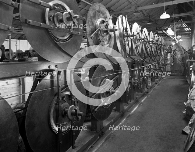 Continuous bandsaw blades, Slack Sellers & Co Ltd, Sheffield, South Yorkshire, 1963. Artist: Michael Walters