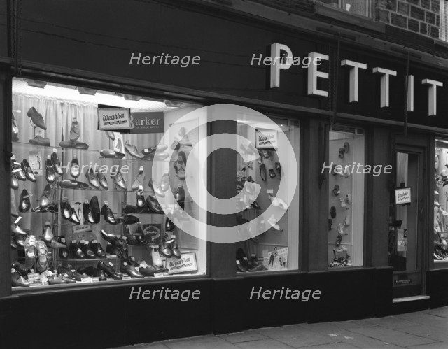 Wearra shoes, shop window display, Mexborough, South Yorkshire, 1960.  Artist: Michael Walters