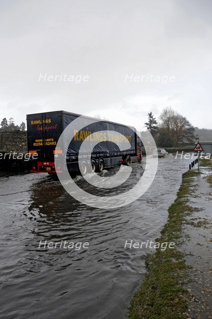 Vehicles on Flooded road at Beaulieu 2008. Artist: Unknown.