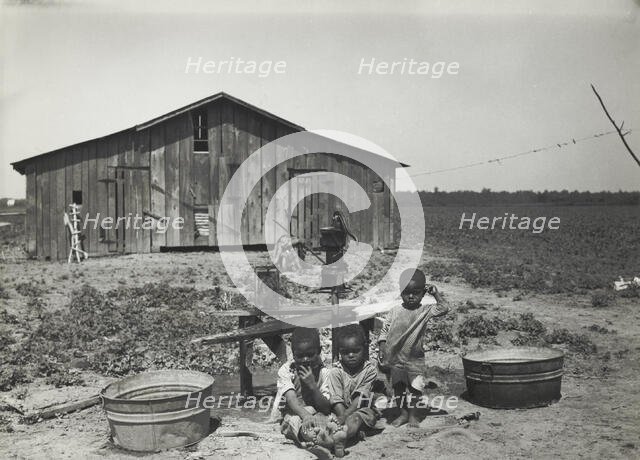 Children of sharecropper, near West Memphis, Arkansas, 1935. Creators: Farm Security Administration, Carl Mydans.