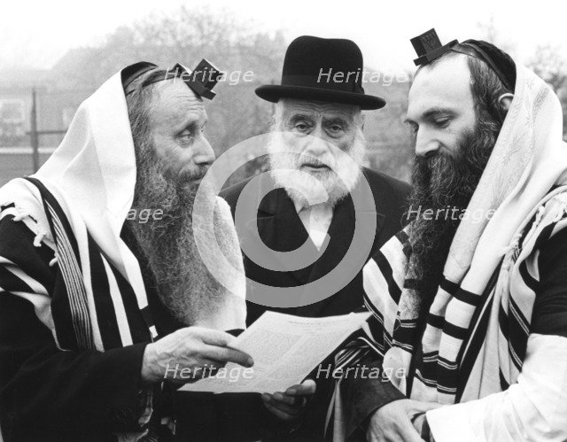 Hasidic Jews wearing tefillin and tzitzit, 1981. Artist: Sidney Harris