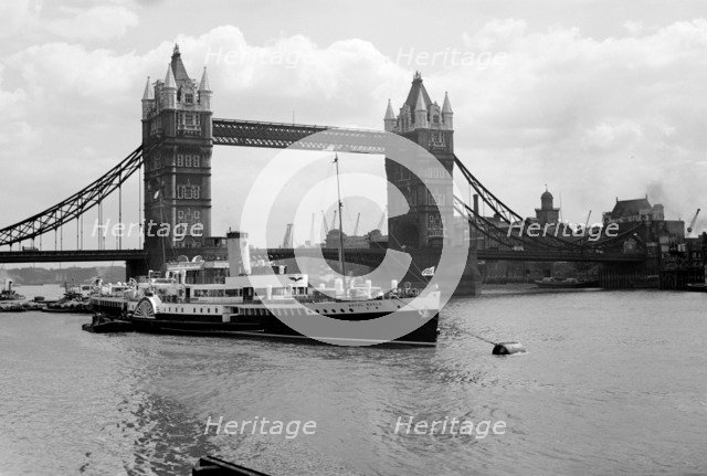 The 'Royal Eagle' paddle steamer with Tower Bridge in the background, London, c1945-c1965 Artist: SW Rawlings