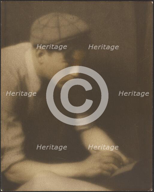 Portrait of a Young Man Writing a Note, 1907-1924. Creator: Louis Fleckenstein.