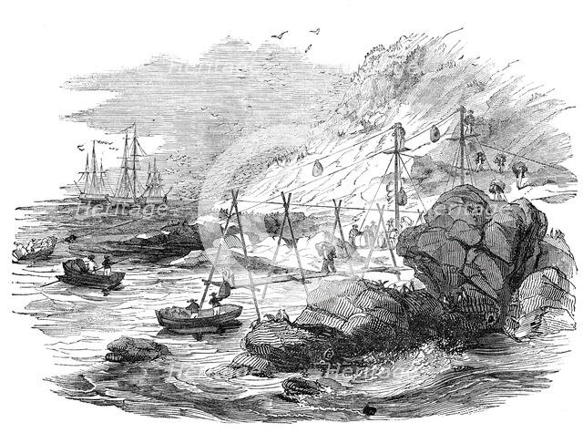 Ichaboe - mode of shipping the guano, 1844. Creator: Unknown.