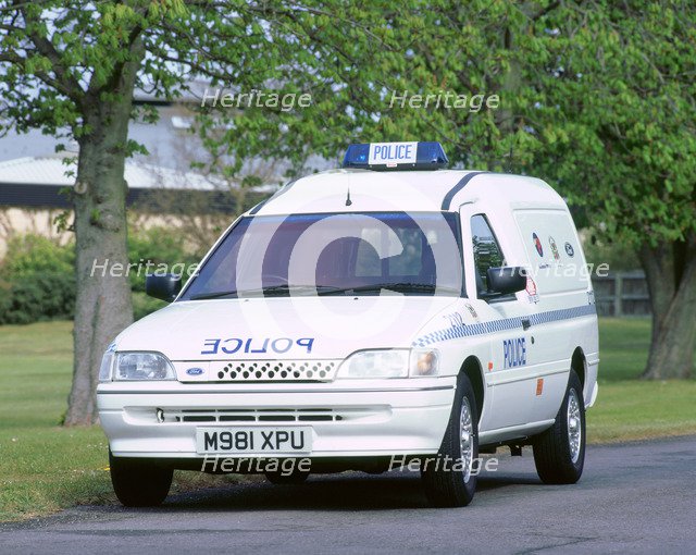 1995 Ford Escort Ecostar electric police van. Artist: Unknown.