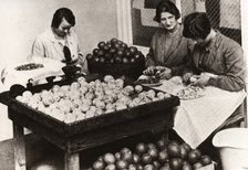 Women peeling lemons for the manufacture of Cloudy Lemon Squash, 1923. Artist: Unknown