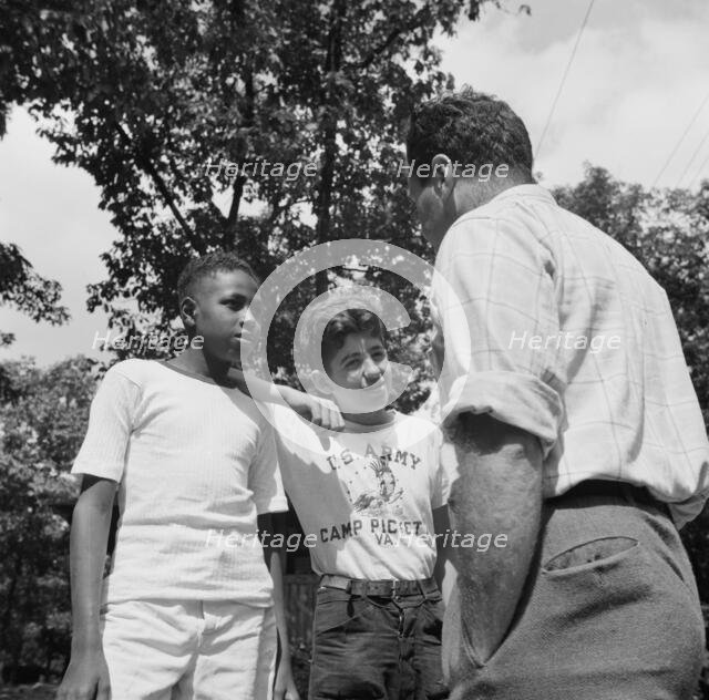 Milton Reiner, program director at Camp Nathan Hale, Southfields, New York, 1943 Creator: Gordon Parks.