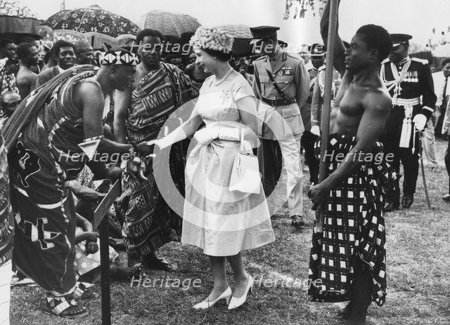 Queen Elizabeth II and the Duke of Edinburgh meeting Ashanti Chiefs, Ghana, 1961. Artist: Unknown
