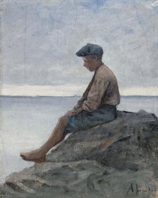 Boy sitting on rocks at the beach, 1880-1889. Creator: Amelie Lundahl.