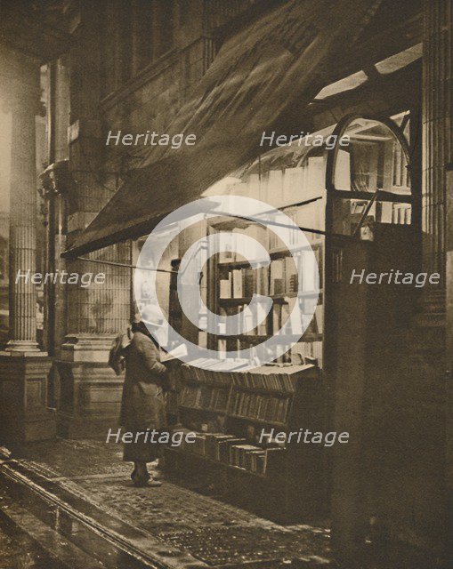 'Wet Winter Evening and a Book Lover in Bloomsbury', c1935. Creator: Fincham.