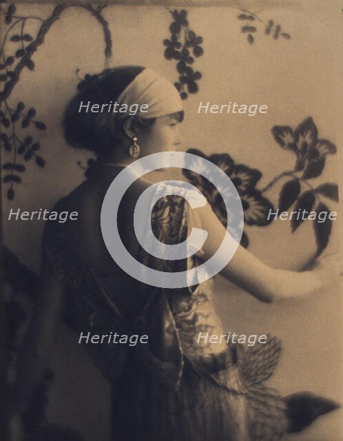 Woman, half-length portrait, facing right, viewed from behind, between 1920 and 1930. Creator: Adolph de Meyer.