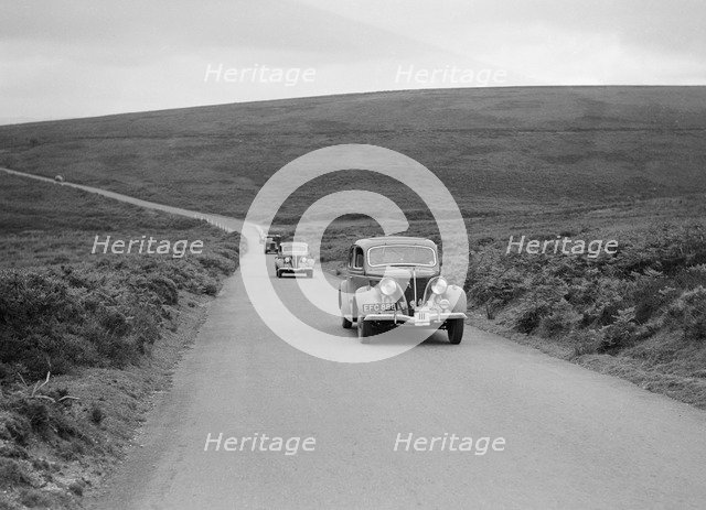 Ford V8s of Viscount Chetwynd and J Whalley competing at the MCC Torquay Rally, July 1937. Artist: Bill Brunell.