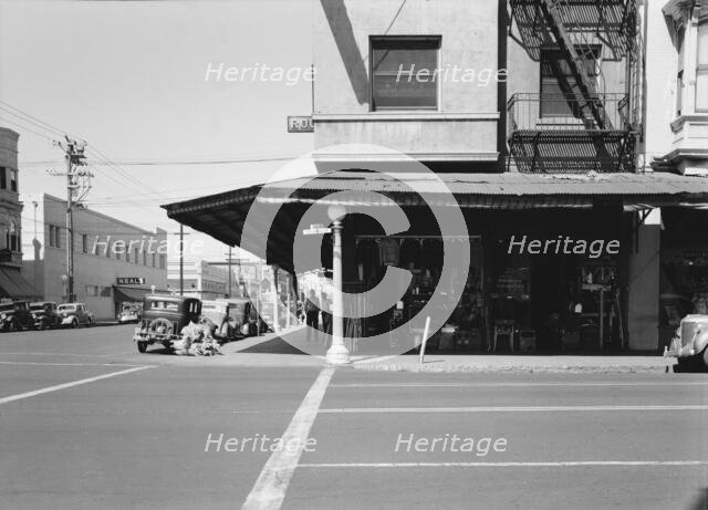 Secondhand store, street corner of San Joaquin Valley town on U.S. 99, Fresno, CA, 1939. Creator: Dorothea Lange.