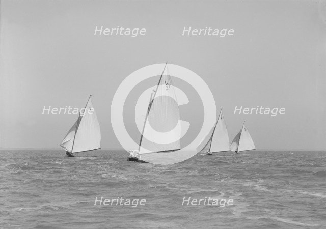 The 6 Metres boats 'Snowdrop', 'The Whim', 'Cheetal' and 'Ejnar' racing downwind. Creator: Kirk & Sons of Cowes.