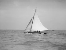 Outing on a 6 Metre sailing yacht (L22), 1912. Creator: Kirk & Sons of Cowes.