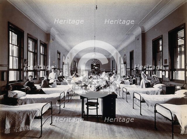 Johannesburg Hospital, South Africa: hospital ward with nurses and male patients, c1905. Creator: Unknown.