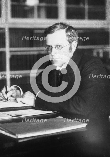 A. Birrell, Chief Sec'y for Ireland in 1908, at desk, 1916. Creator: Bain News Service.