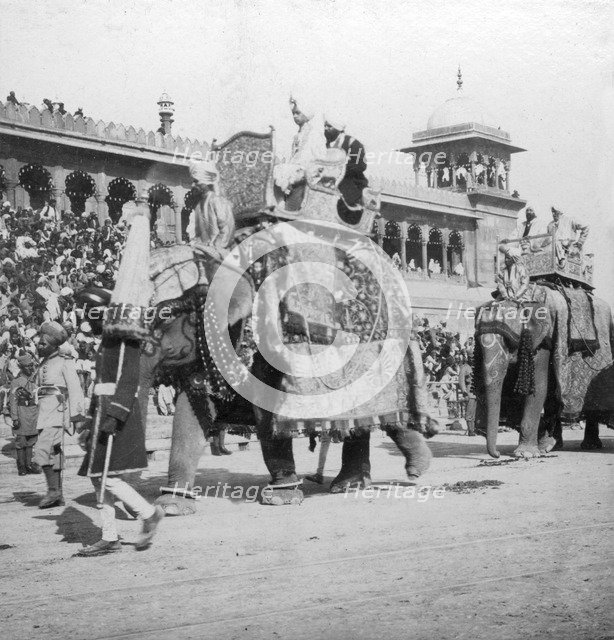 An elephant procession passing Jumma Masjid, Delhi, India, 1900s.Artist: H Hands & Son