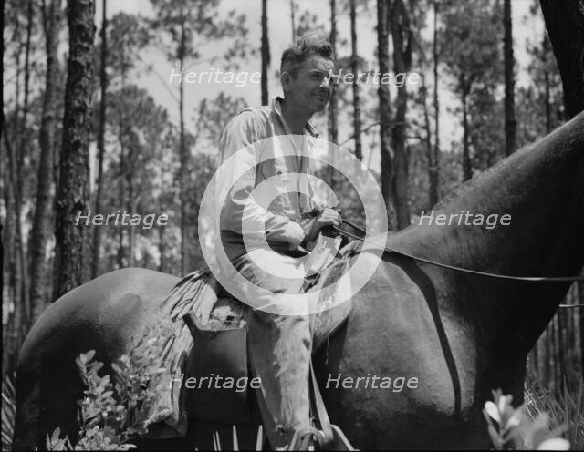 Overseer in the turpentine woods, Georgia, 1937. Creator: Dorothea Lange.