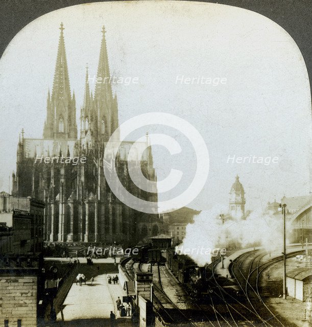 Cologne Cathedral from a railway bridge, Cologne, Germany.Artist: EW Kelley