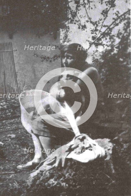 Marina Tsvetaeva with her dog. Savoy, 1930.