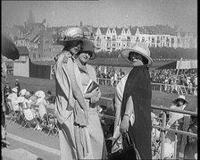 Three Female Civilians Wearing Smart Summer Outfits Posing for the Camera in a Horse Race, 1920. Creator: British Pathe Ltd.