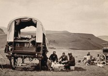 South Africa: a group of Europeans eating a meal beside their wagon in the Transvaal, c1890s. Creator: Dudley Kidd.